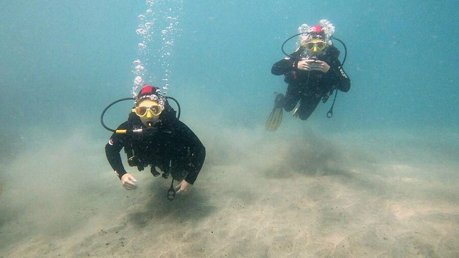 Fuerteventura: Introduction to Scuba Diving - Getting fitted with wetsuit, boots, fins, and tank