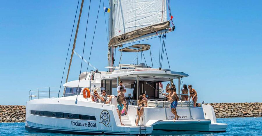Gran Canaria: Catamaran Day Trip with Food and Drinks - Leaving Puerto Rico Along Gran Canaria’s Southwest Coast