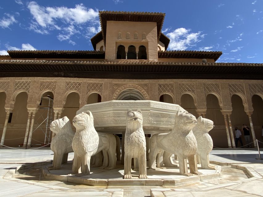 Granada: Alhambra & Generalife Fast-Track Guided Tour - Alcazaba towers and views across Granada