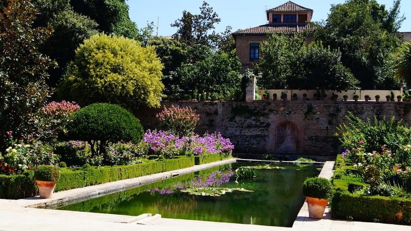 Granada: Gardens of the Alhambra and Generalife Regular Tour - Alcazaba walls and views over Granada