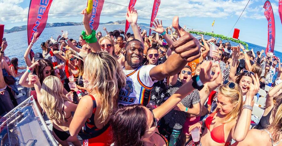 Ibiza: Ocean Club Boat Party with Premium Drinks, Food, & DJ - The swim stop in Ibiza’s turquoise water