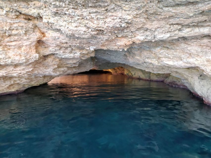 Ibiza: Snorkeling and SUP Paddle, Beach and Cave Boat Tour - Cala Bassa: A Sheltered Beach Stop