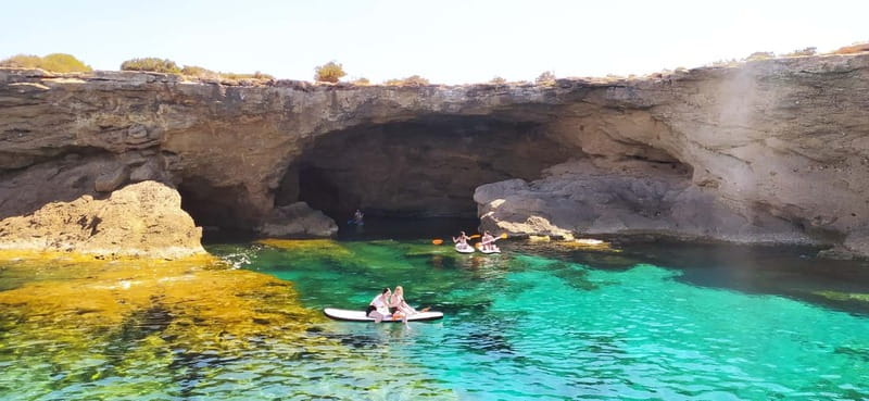 Ibiza: Snorkeling, Sunset Beach and Cave Boat Trip - First water stop: reefs, fish, and easy snorkeling