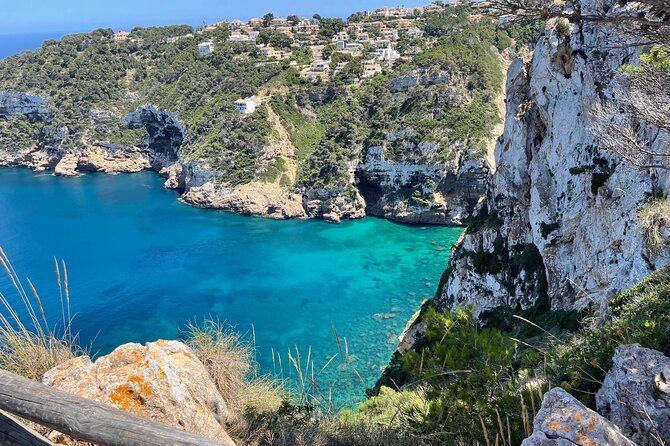 Kayak Paradise: Cala Portixol Snorkel, Cave & Cliff Jumping Tour - The blue lagoon and optional cliff jumping
