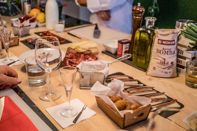 La Boqueria Market and Paella Cooking Class in Barcelona - What the guides add to the meal