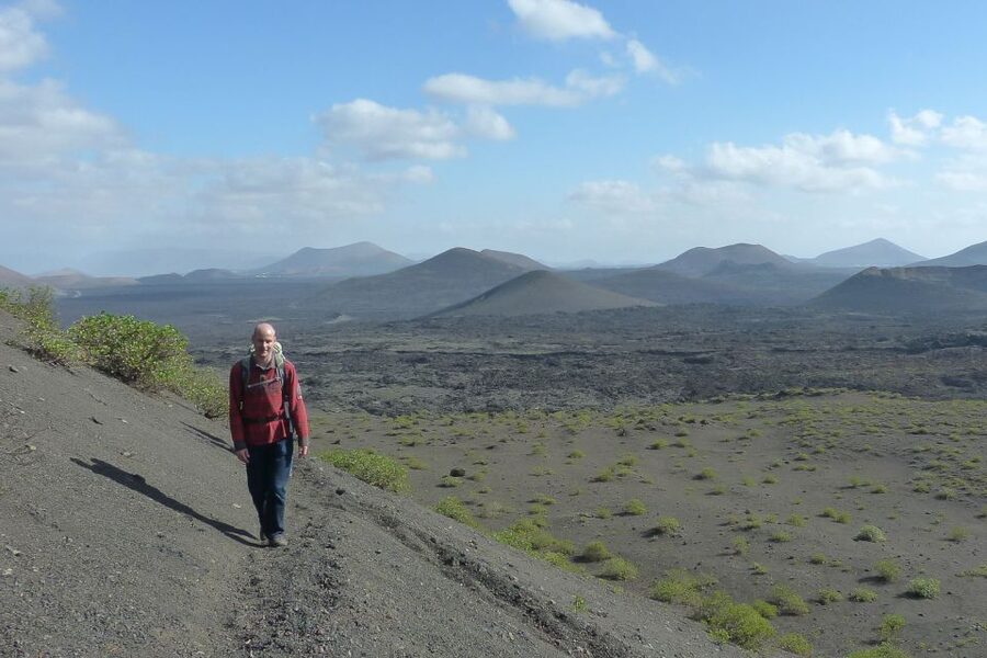 Lanzarote: Guided Volcano Hike with Transfers - Walking across the hardened lava