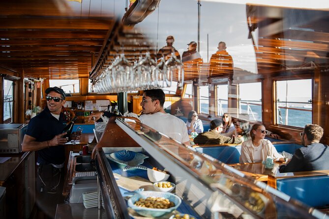 Live Music & Sunset Wooden Boat in Barcelona - Drinks, snacks, and the onboard bar