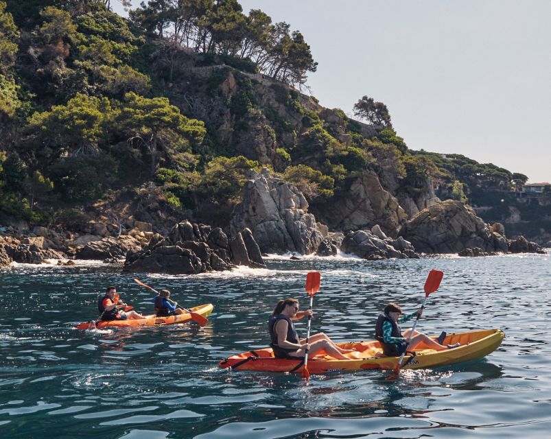 Lloret de Mar: Costa Brava Kayak Tour and Swimming - Starting on Fenals Beach with a simple safety briefing