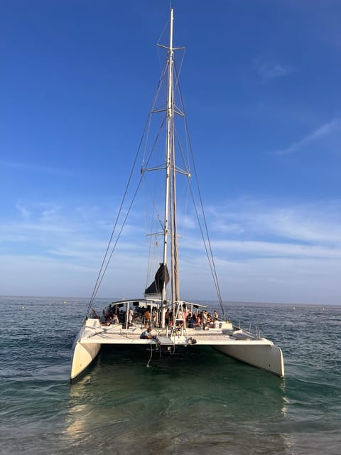 Lloret de Mar: Sunset Catamaran Cruise with DJ and Drinks - Key things to know before you book
