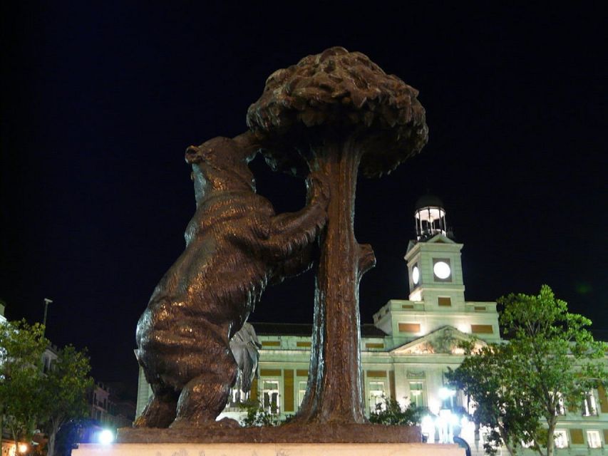 Madrid: Enchanted Evening Walking Tour in Spanish - Puerta del Sol and the story of Madrid’s development