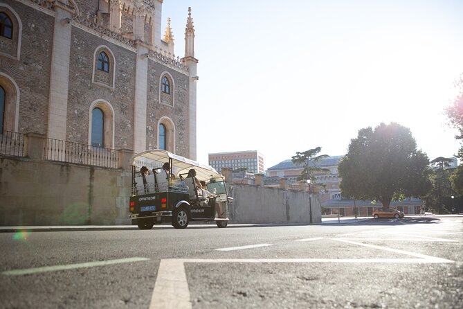Madrid Express Tour with Local Guide in Eco Tuk Tuk Private - Cibeles Palace and the Bank of Spain