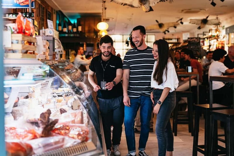 Madrid: Guided Tapas and Wine Tour with Terrace Visit - Markets, local restaurants, and a full evening of small plates