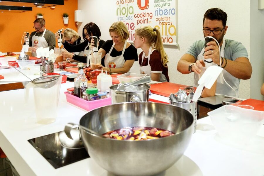 Madrid: Half-Day Spanish Cooking Class - Starting at the market with paella ingredients