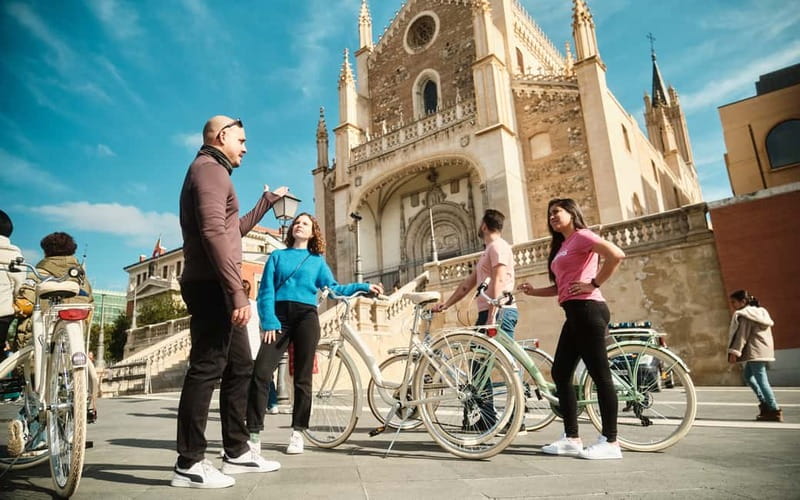 Madrid: Highlights Guided Vintage Bike Tour and Tapas Option - Royal Palace, Plaza de la Villa, and Old Madrid