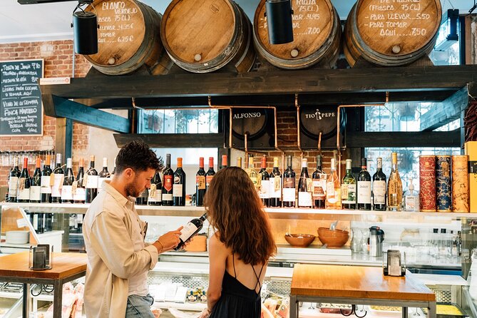 Madrid Tapas & Wine Tour with Rooftop Views and Local Guide - Starting at Plaza de San Miguel and moving into La Latina