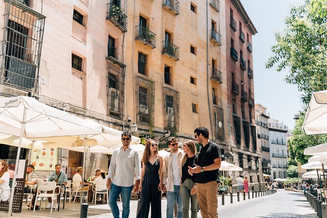 Madrid Tapas & Wine Tour with Rooftop Views and Local Guide - The evening rooftop ending at Gran Vía