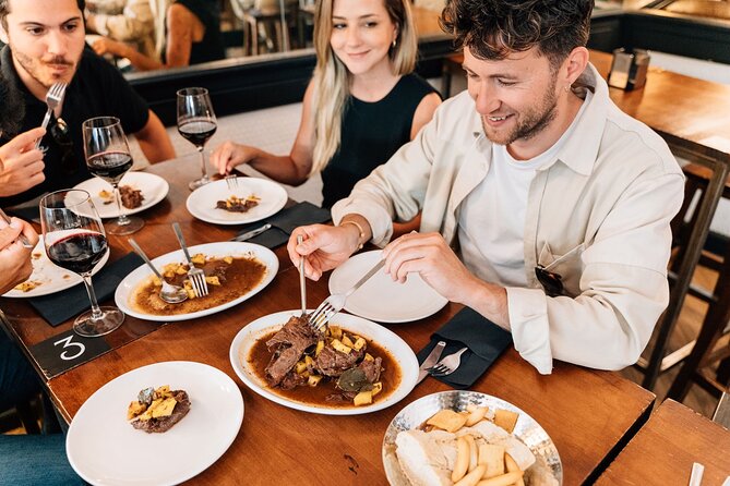 Madrid Tapas & Wine Tour with Rooftop Views and Local Guide - The guides make or break the experience