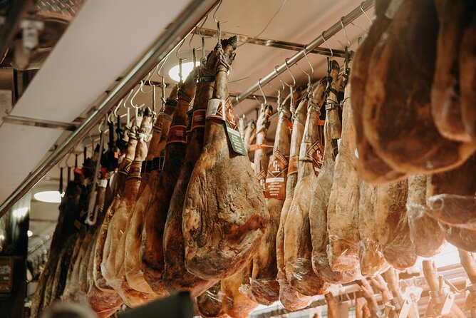 Madrid Ultimate Spanish Cuisine Food Tour - Moega and the chorizo-stuffed bread