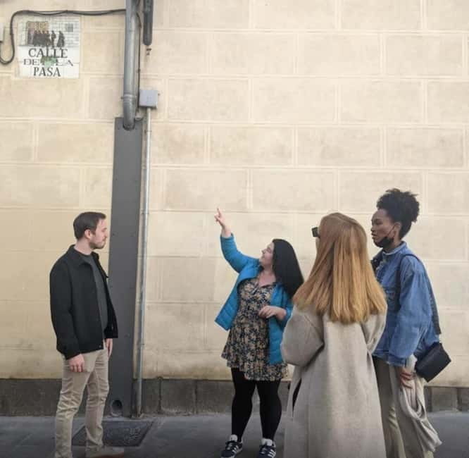 Madrid: Welcome to Madrid Guided Walking Tour - Plaza Mayor, where the grand square gets a darker past