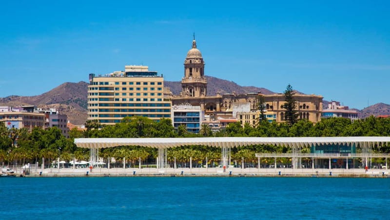 Malaga: Castle Hill and Fisherman Village E-Bike Tour - Key points at a glance
