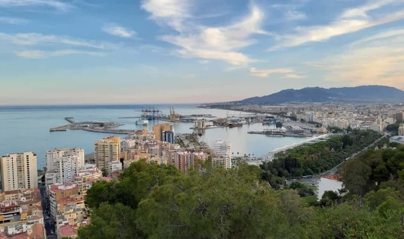 Malaga: Castle Hill and Fisherman Village E-Bike Tour - Riding through street art and changing neighborhoods