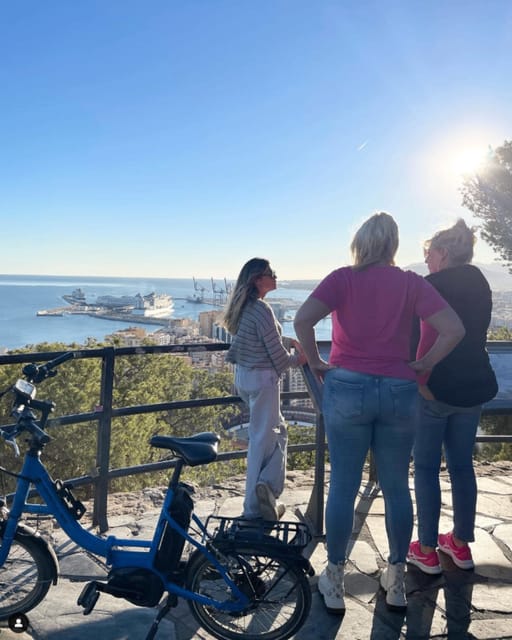 Malaga: Castle Hill and Fisherman Village E-Bike Tour - Who should book this experience?