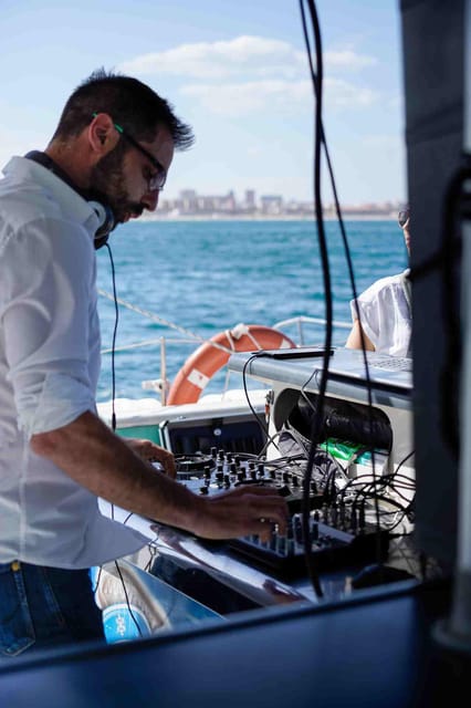 Malaga: Catamaran Sailing Cruise with Swimming & Optional DJ - Drinks, music, and the choice of atmosphere