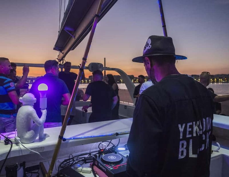 Malaga: Sailing Catamaran Sunset Cruise with Live DJ & Drink - Setting out from Málaga Port