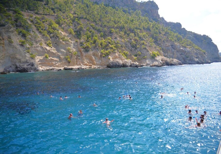 Mallorca: 2-Hour Coastline & Malgrat Islands Catamaran Tour - The boat, seating, food, and onboard mood