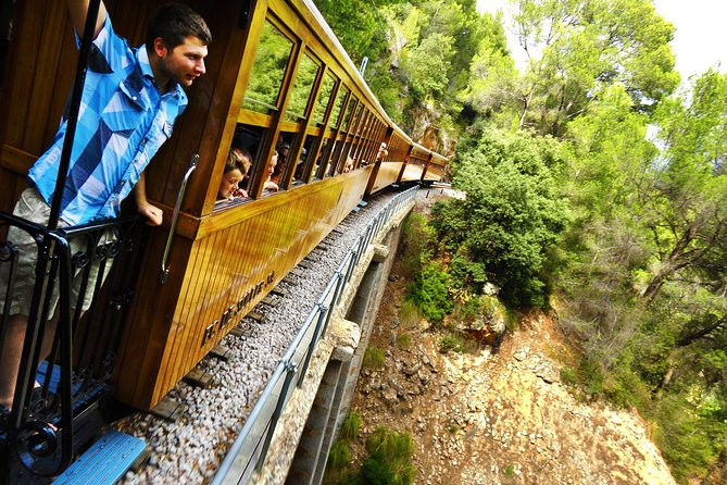 Mallorca in One Day Sightseeing Tour with Boat Ride and Vintage Train - Leaving Palma for the Serra de Tramuntana