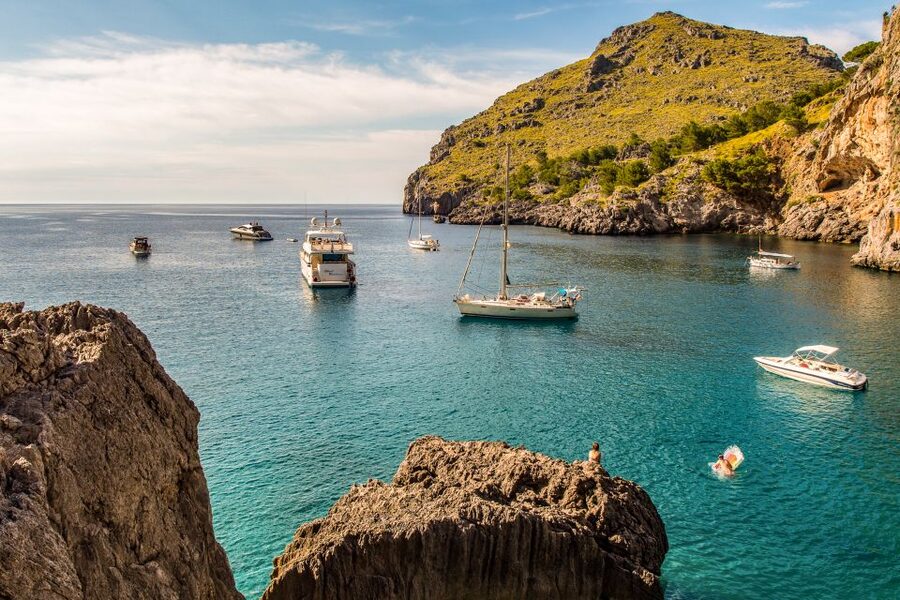 Mallorca: Island Trip by Train, Tramway, and Boat - The boat along Mallorca’s rugged north coast
