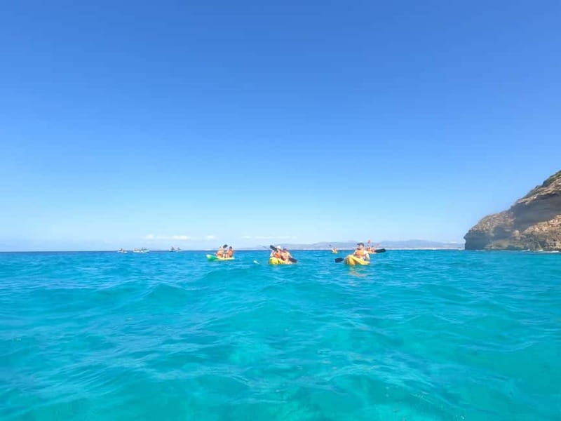 Mallorca: Sea Cave Kayaking Tour with Snorkeling and a Snack - The first paddle: simple instruction, real open water