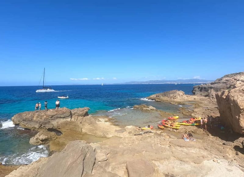 Mallorca: Sea Cave Kayaking Tour with Snorkeling and a Snack - The return paddle and what the price covers