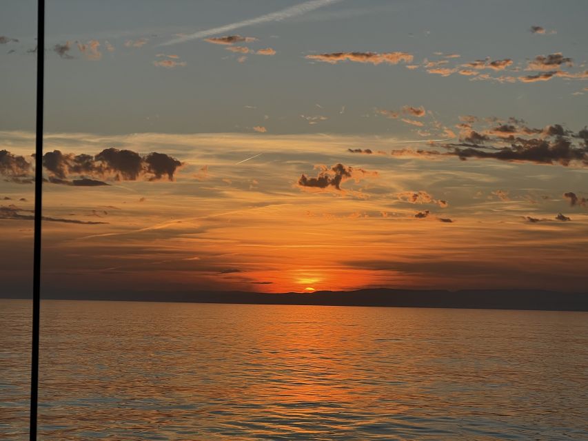 Marbella: Sunset Sailing Trip with Drinks and Snacks - What the skipper adds to the evening