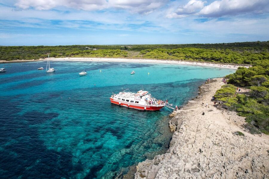 Menorca: Full-Day Boat Tour with Paella Lunch - Cala en Turqueta: two hours in a famous cove