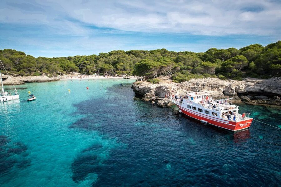 Menorca: Full-Day Boat Tour with Paella Lunch - What the day feels like onboard