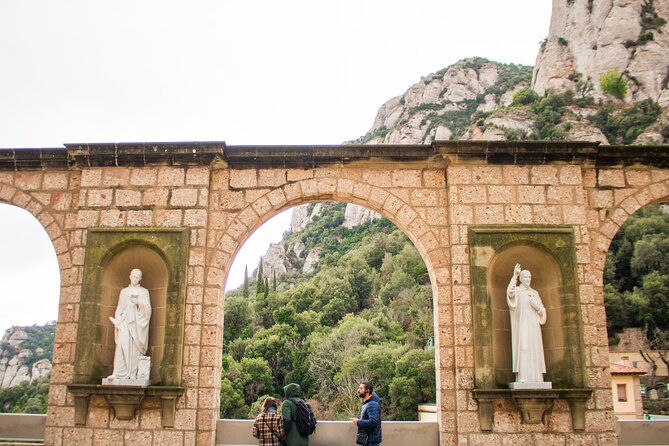 Montserrat Full Day Tour with Farmhouse Lunch and Winery Visit - Reaching Montserrat and meeting La Moreneta