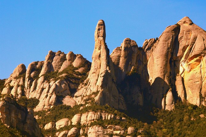 Montserrat Half Day with Cable Car and Easy Hike from Barcelona - The Sant Joan funicular and high mountain views