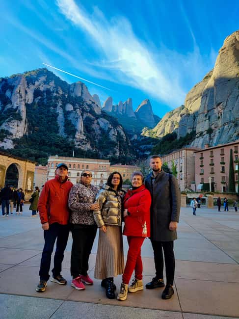Montserrat Small Group Tour with Train and Cable Car - Guided walking tour at Montserrat Monastery