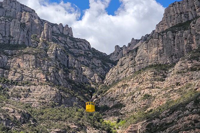 Montserrat Tour by Train with Cable Car and Cogwheel - Returning to Plaça d’Espanya