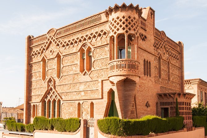 Montserrat Tour with Black Madonna & Two Departure Options - Arriving at the monastery after the mountain climb