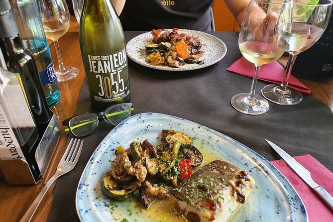 Montserrat & Winery Visit Tour with Traditional Farmhouse Lunch - Down into Penedès wine country