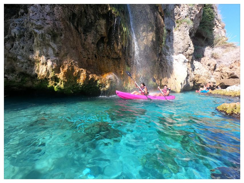 Nerja: Cliffs of Maro-Cerro Gordo Guided Kayak Tour - Swimming in clear blue water