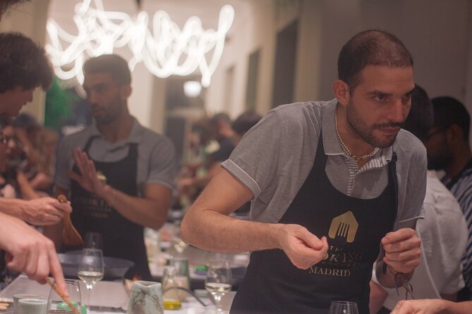 Paella Cooking Class in Madrid with Bottomless Wine Pairing - Making paella in pairs, then tasting several recipes