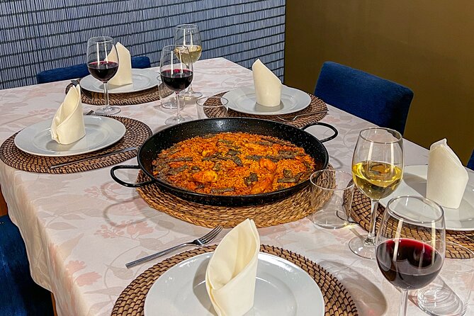 Paella Cooking Class, Wine Tasting & Central Market in Valencia - Tapas, wine, and a long table lunch