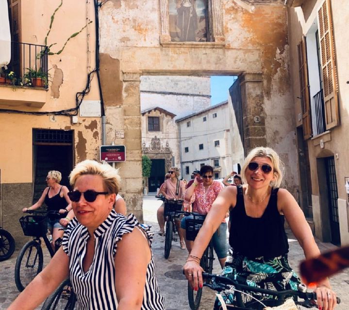 Palma de Mallorca: Guided Bicycle Tour - Entering Palma’s medieval old town