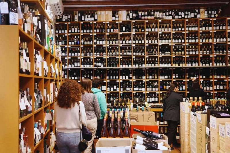 Picasso Museum and Walking Tour Plus Wine Tasting Upgrade - Carrer d’Avinyó and the name behind a famous painting