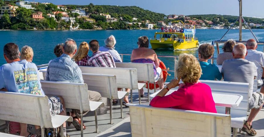 Port Mahon: 1-Hour Harbor Cruise with Underwater Views - Finding the yellow catamaran at Moll de Llevant