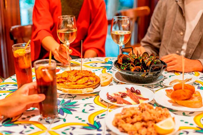 Private Tour: Tapas, Wine & Flamenco Show in Barcelona’s Old Town - Walking through the Gothic Quarter and El Born
