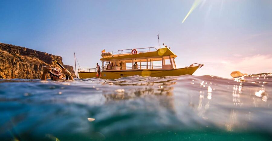 Puerto de Mogan: Boat and Snorkeling Trip - Leaving Puerto de Mogán on the Yellow Boat